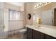 Clean secondary bathroom featuring vanity, a toilet, and a shower with a curtain at 15560 W Clear Canyon Dr, Surprise, AZ 85374