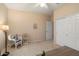Comfortable bedroom with closet, carpeted floors, natural light, and charming decor at 15560 W Clear Canyon Dr, Surprise, AZ 85374
