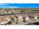 Wide aerial view of neighborhood and mountain in distance at 1563 S 227Th Ave, Buckeye, AZ 85326