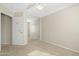 Bedroom featuring a mirrored closet, providing a bright and functional space, with carpeted flooring at 1563 S 227Th Ave, Buckeye, AZ 85326