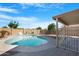 Backyard inground pool with shaded patio area at 1563 S 227Th Ave, Buckeye, AZ 85326