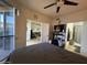 Bedroom view towards the living room and bathroom, with access to the patio at 1701 E Colter St # 138, Phoenix, AZ 85016