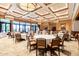 Spacious banquet room with elegant lighting, tables, and seating for large gatherings at 1775 N 164Th Dr, Goodyear, AZ 85395