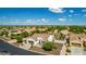 Inviting single-story home featuring a tile roof, low-maintenance landscaping, and an attached two-car garage at 1775 N 164Th Dr, Goodyear, AZ 85395