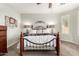 Inviting main bedroom with a comfortable bed, soft carpet, and matching bedside lamps at 1775 N 164Th Dr, Goodyear, AZ 85395