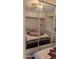 Cozy bedroom featuring mirrored closets, offering style and functionality at 2058 S Walla Walla Cir, Apache Junction, AZ 85119