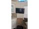 Interior room view with television, countertop, cabinet, and wooden chair at 2058 S Walla Walla Cir, Apache Junction, AZ 85119