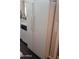 Classic white refrigerator in a clean kitchen space, adjacent to a sleek dishwasher at 2058 S Walla Walla Cir, Apache Junction, AZ 85119
