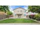 Expansive backyard featuring vibrant landscaping and covered patio at 23217 N 22Nd Pl, Phoenix, AZ 85024