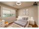 Comfortable bedroom with modern decor, a ceiling fan, and neutral paint at 23217 N 22Nd Pl, Phoenix, AZ 85024