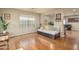 Open-concept living area with hardwood floors and a large window for natural light at 23217 N 22Nd Pl, Phoenix, AZ 85024