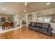 Spacious living room with hardwood floors, neutral walls and an open floor plan at 23217 N 22Nd Pl, Phoenix, AZ 85024
