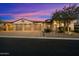 Stunning home with a three-car garage, stone accents, and meticulous landscaping at 2333 N 87Th Pl, Mesa, AZ 85207