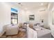 Bright and airy living room with comfortable seating and natural light at 2333 N 87Th Pl, Mesa, AZ 85207