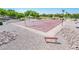 Outdoor basketball court with well-defined lines and lighting, perfect for recreational games at 24805 W Vista Norte St, Buckeye, AZ 85326