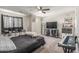 A bedroom featuring a ceiling fan, TV, and musical instruments at 24805 W Vista Norte St, Buckeye, AZ 85326
