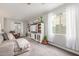 Inviting living room featuring comfortable seating, media center and neutral tones at 24805 W Vista Norte St, Buckeye, AZ 85326