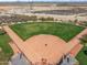 Aerial view of a baseball field with desert and mountain views at 26336 W Tina Ln, Buckeye, AZ 85396