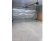 Garage with an insulated door and speckled epoxy floors at 26336 W Tina Ln, Buckeye, AZ 85396