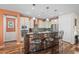 Modern kitchen with an island with a breakfast bar, sleek countertops and stainless steel appliances at 26336 W Tina Ln, Buckeye, AZ 85396