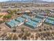 Aerial view of community pickleball courts with shade structures and desert landscape at 26336 W Tina Ln, Buckeye, AZ 85396