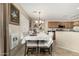 Dining room is adjacent to the kitchen and features a table with seating for six people at 31527 N Sundown N Dr, San Tan Valley, AZ 85143