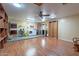 Laundry room view with appliances, leading to kitchen, alongside generous open shelving space at 3224 W Ironwood Dr, Phoenix, AZ 85051