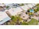 Home featuring a covered patio, well-kept yard, a fire pit, and a refreshing pool, creating the ultimate outdoor living experience at 3348 E Sequoia Dr, Phoenix, AZ 85050