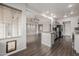 Open-concept kitchen featuring stainless appliances and an island with granite counters at 3348 E Sequoia Dr, Phoenix, AZ 85050