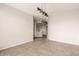 Spacious living room featuring tile floors and neutral walls at 3348 E Sequoia Dr, Phoenix, AZ 85050
