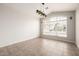 Bright living room featuring tile floors and large windows at 3348 E Sequoia Dr, Phoenix, AZ 85050