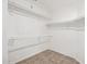 Walk-in closet offering ample shelving for storage and organization at 3348 E Sequoia Dr, Phoenix, AZ 85050