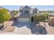 Charming two-story home featuring well maintained landscaping, and a two car garage at 41581 W Somerset Dr, Maricopa, AZ 85138