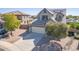 Beautiful home featuring well-maintained landscaping and an inviting facade at 41581 W Somerset Dr, Maricopa, AZ 85138
