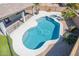 Beautiful blue pool with connected hot tub and covered patio area at 41581 W Somerset Dr, Maricopa, AZ 85138