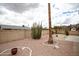 Private backyard featuring desert landscaping and mature palm trees, ideal for relaxation at 4227 E Yowy St, Phoenix, AZ 85044