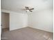 Bedroom featuring neutral carpet, a ceiling fan, and ample natural light that enhances its bright feel at 4576 E Waterman St, Gilbert, AZ 85297