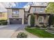 Beautiful two-story stucco home with a tile roof, stone accents, and well-manicured landscaping at 4576 E Waterman St, Gilbert, AZ 85297