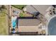 Bird's eye view of backyard featuring pool, manicured landscaping, and ample outdoor space at 4610 S Hassett Cir, Mesa, AZ 85212