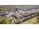 Aerial perspective captures backyard with pool, patio, and desert-style landscaping at 4610 S Hassett Cir, Mesa, AZ 85212