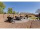 Lovely backyard with dining, barbecue and play area at 4610 S Hassett Cir, Mesa, AZ 85212