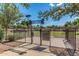 Community dog park with separate runs and play areas, fully fenced for safety and security at 4610 S Hassett Cir, Mesa, AZ 85212