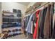 Spacious walk-in closet with shelving and hanging space for organized storage at 4829 E Charleston Ave, Scottsdale, AZ 85254
