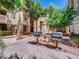 Community outdoor patio and grilling area with built-in gas grills, perfect for barbecues and entertaining at 5303 N 7Th St # 134, Phoenix, AZ 85014