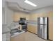 Well-lit kitchen with stainless steel appliances and plenty of cabinet space at 5303 N 7Th St # 134, Phoenix, AZ 85014