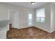 A living room boasting wood floors and natural light streaming through a window at 5303 N 7Th St # 134, Phoenix, AZ 85014