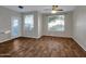 Spacious living room featuring wood floors and a view of the outside at 5303 N 7Th St # 134, Phoenix, AZ 85014