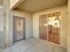 A screened-in patio featuring neutral-toned walls, flooring, and a sliding door for privacy at 5303 N 7Th St # 134, Phoenix, AZ 85014