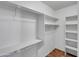 Walk-in closet featuring ample shelving and storage, showcasing organization at 5303 N 7Th St # 134, Phoenix, AZ 85014