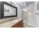 Updated bathroom with granite vanity and glass shower at 5755 W Harrison St, Chandler, AZ 85226